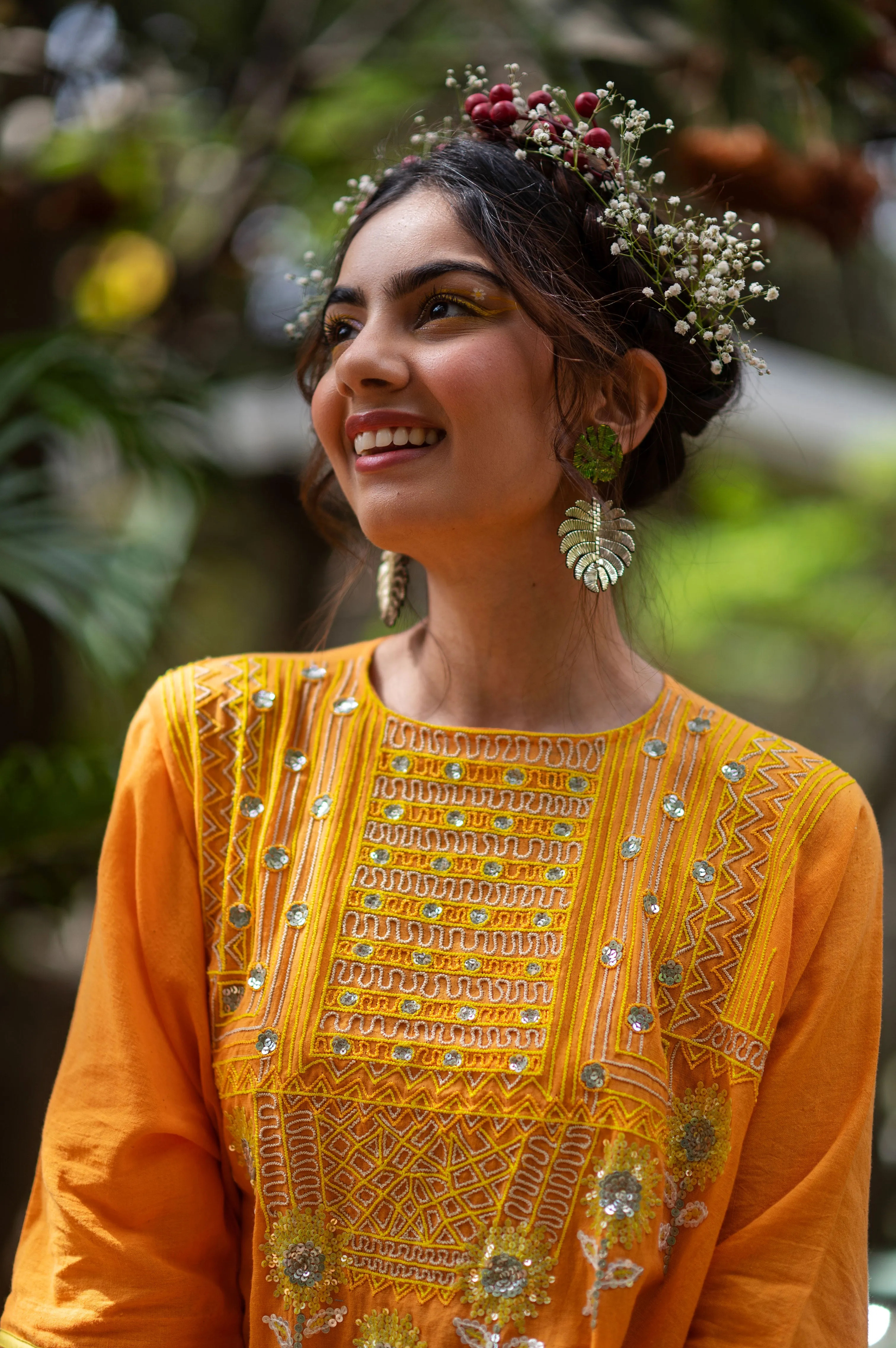 Cotton kurta with hand embroidered sequined yoke and hand embroidered sunflower motifs