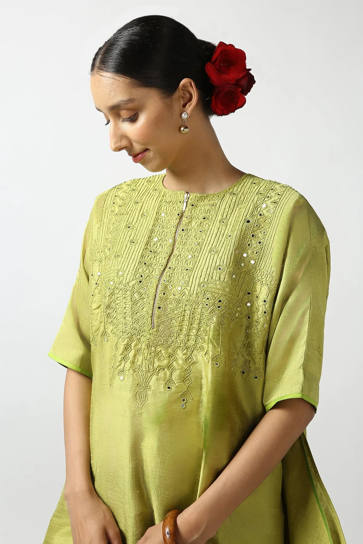 Green Raw Silk Top with Mirror Work Yoke. Tussar Pant or M. Giri Pant.